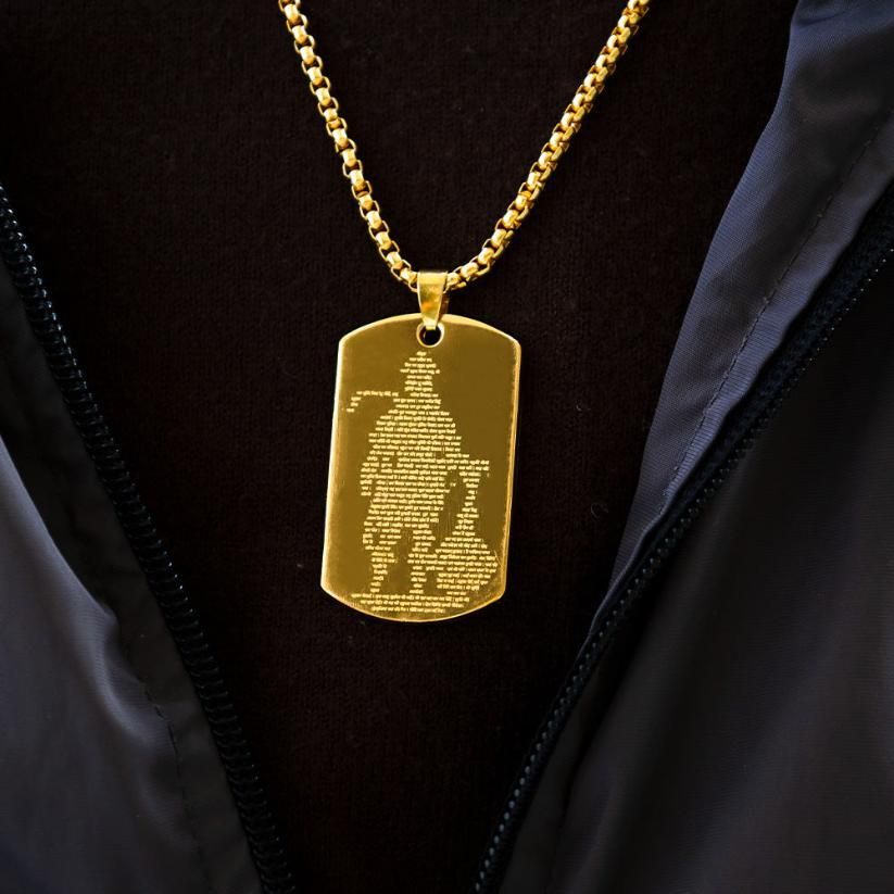 RudraPrana™ Hanuman Chalisa Engraved Divine Protection Pendant on a gold chain, symbolizing strength and devotion.