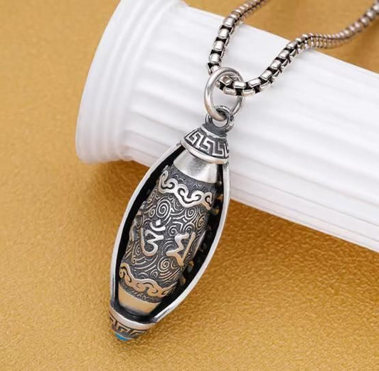 RudraPrana™ Om Engraved Spiritual Protection Pendant Necklace with intricate design on a silver chain.
