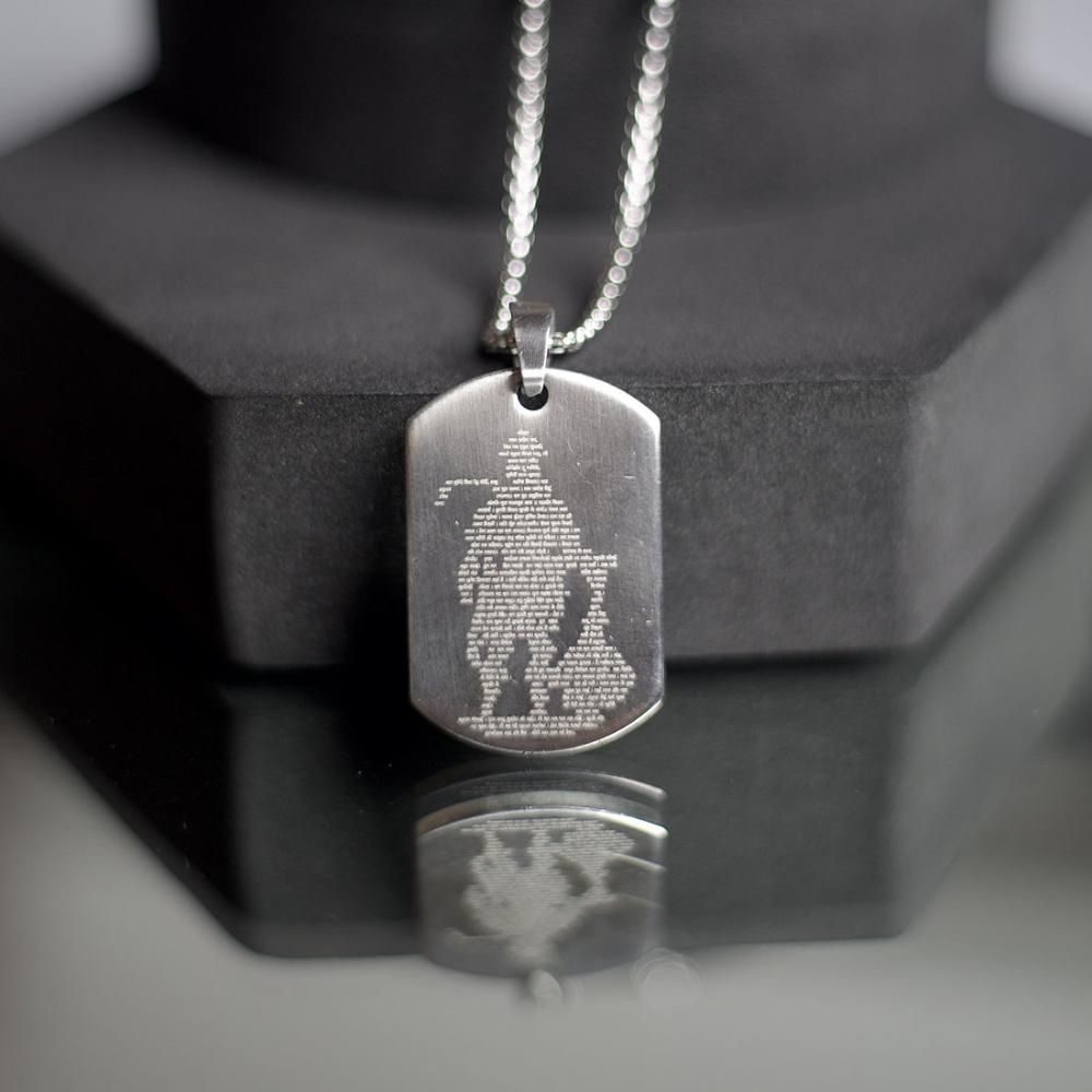 RudraPrana™ Hanuman Chalisa Engraved Divine Protection Pendant on a display, showcasing the micro-engraved Lord Hanuman.