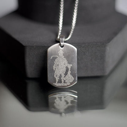 RudraPrana™ Hanuman Chalisa Engraved Divine Protection Pendant on a display, showcasing the micro-engraved Lord Hanuman.